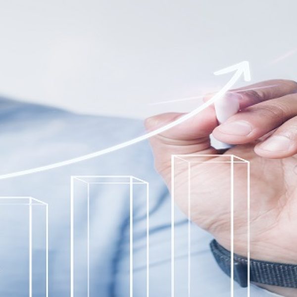 Man giving a bar graph presentation using a high technology digital pen